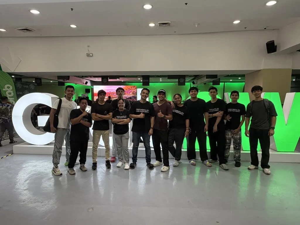 Events Rental Hub team on site at a large Grab corporate event with illuminated venue letters